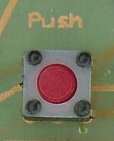 Temporary-selection pushbutton