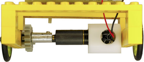 Gearmotor press fit into mount with hole for wires