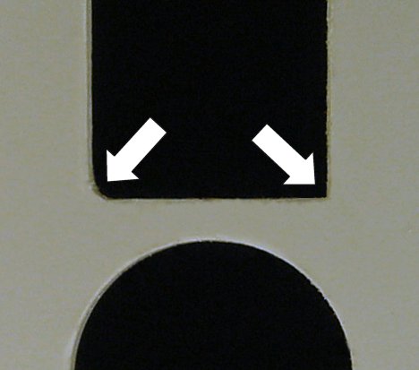 The left corner is rounded from the end mill. The right corner was then squared with a file.